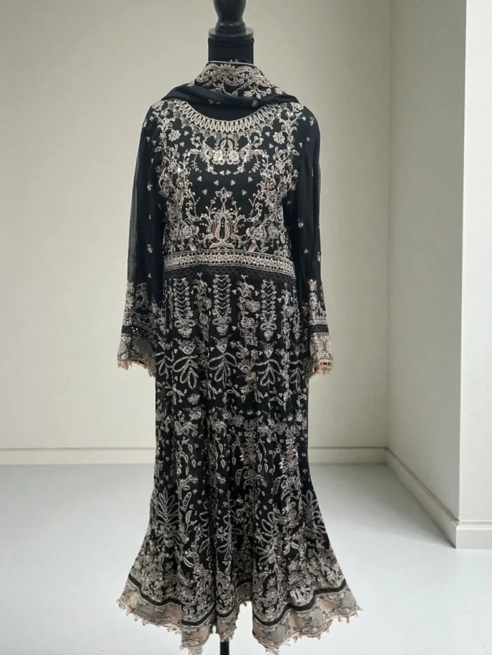 Black maxi dress with all-over intricate light gold/silver thread embroidery.