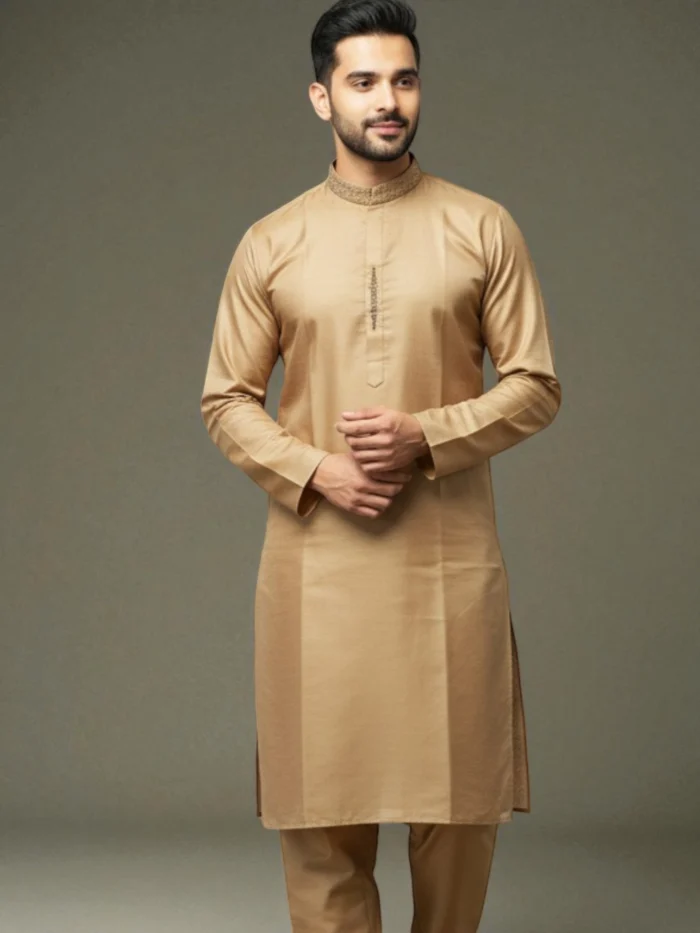 A long, golden-brown kurta made of fabric with a slight sheen (possibly silk). The band collar and narrow button placket are detailed with subtle gold or brown thread embroidery.