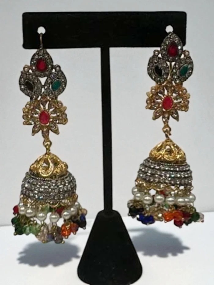 Antique gold and rhodium jhumka earrings with multi-color stones and assorted bead drops.