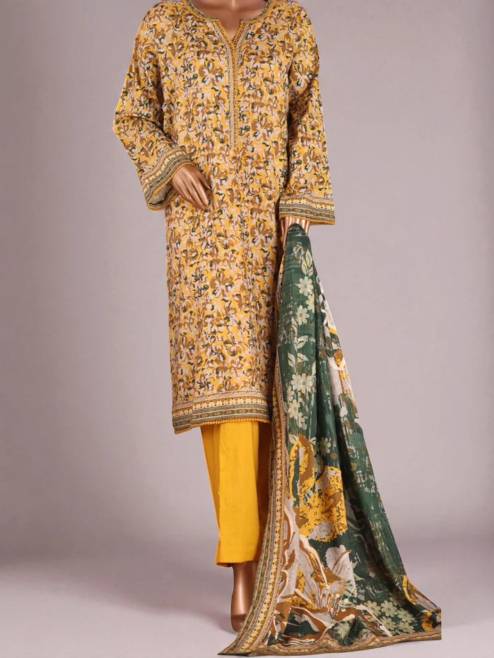Mannequin wearing a long-sleeved yellow cotton viscose Kurta with dense botanical print, matching yellow trousers, and holding a green and yellow printed dupatta. Available in sizes S, M, L.