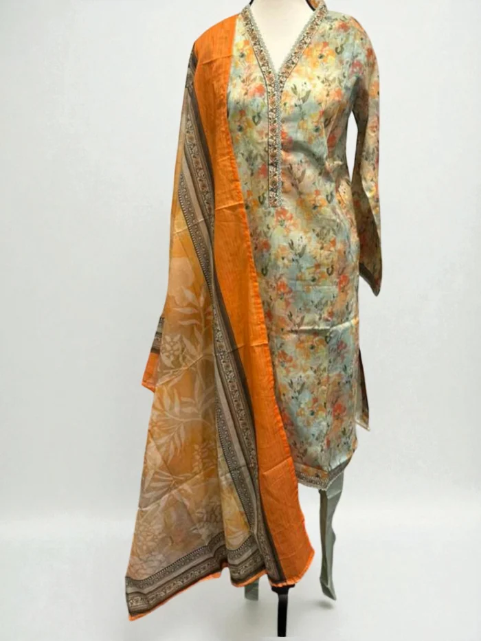 Mannequin wearing a long-sleeved light blue and orange floral printed viscose Kurta with an embellished V-neckline, paired with a vibrant orange printed dupatta. Available in sizes S, M, L.